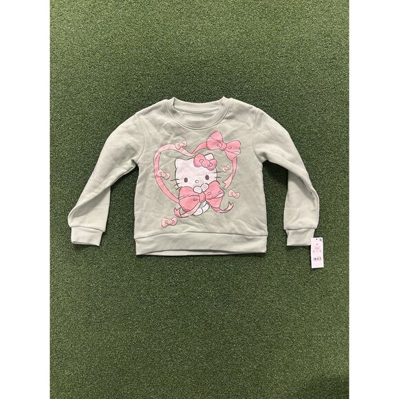 Sanrio Tops - Hello Kitty sweatshirt with a graphic of Hello Kitty surrounded by pink bows XS